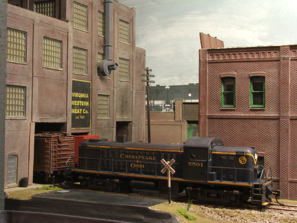 C&O RS1 no.5501 places an empty box car at the Virginia Western Meat Co. The C&O only had 2 RS1's on it's books, and only lasted a couple of years before being sold off.