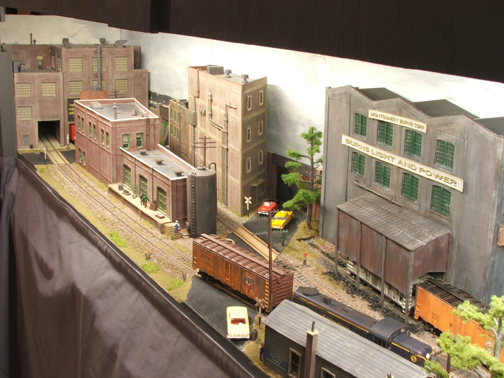 A view across Mason's Bridge Yard. The building between the 2 diverging tracks is Jim's Printing.