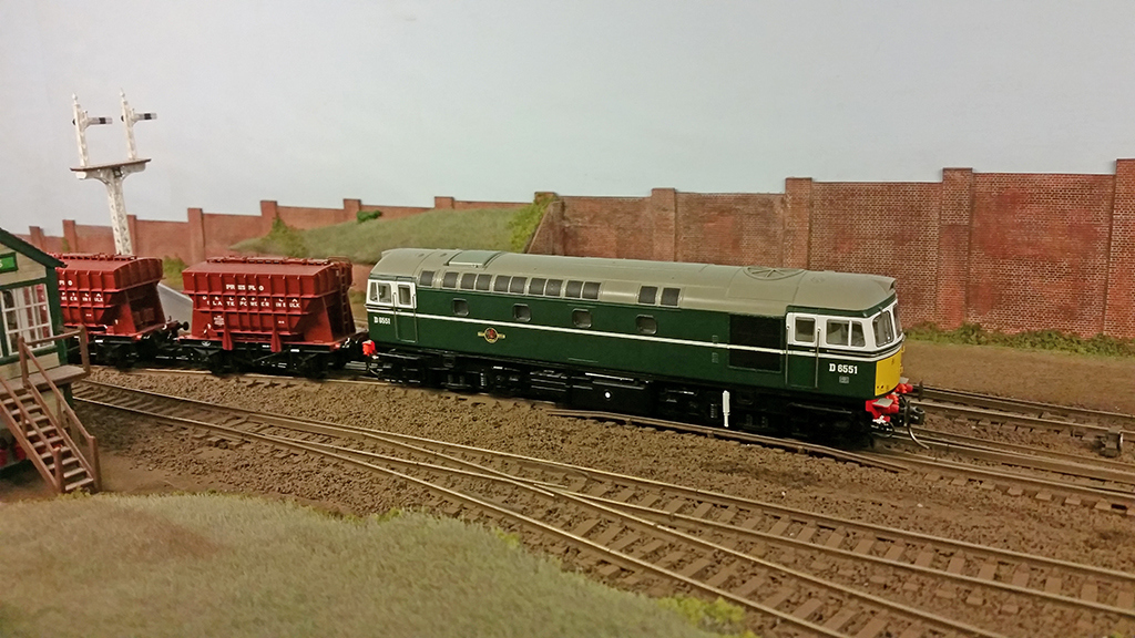 Class 33 D6551 departs West Sands with a cement train.