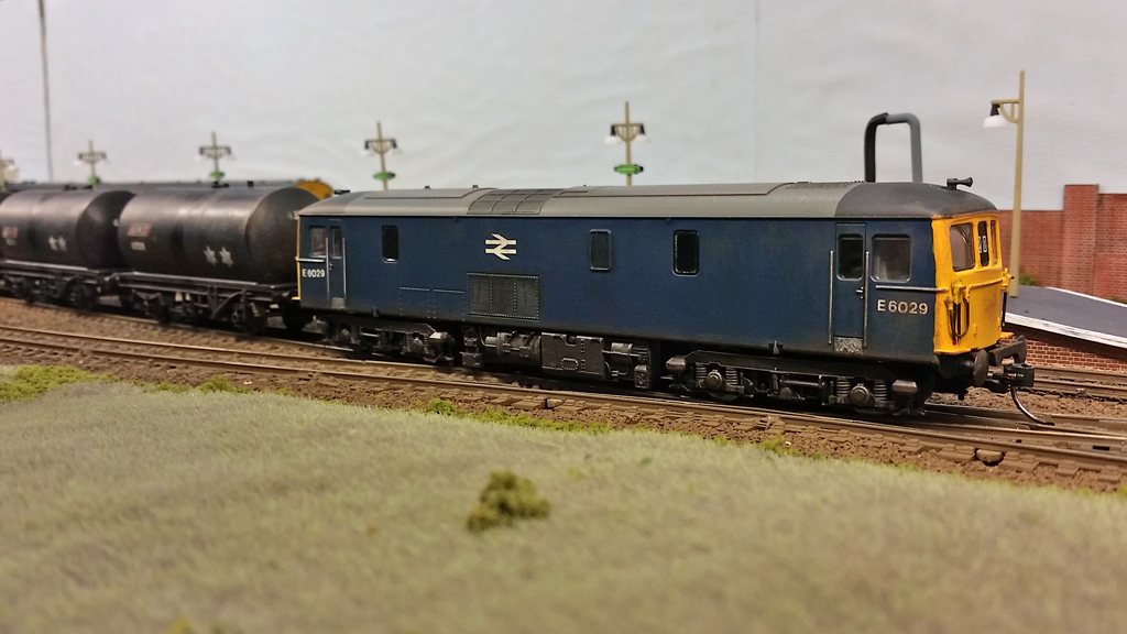 Class 73 #E6029 leaves Blackhurst at the head of an oil train.