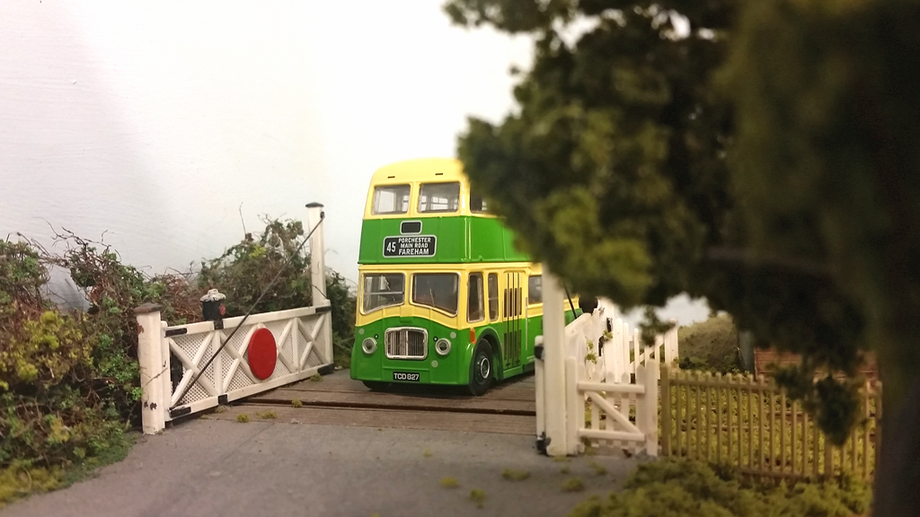 A Southdown Queen Mary bus crosses the disused level crossing.