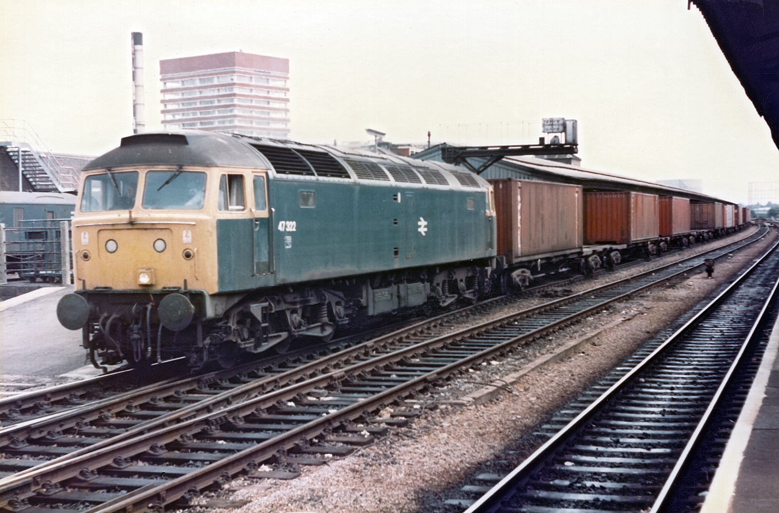 47322 in BR blue livery heads westbound Freightliner train through Reading.