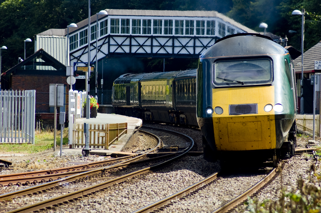 A GWR Castle Class set HST leaves Bodmin Parkway